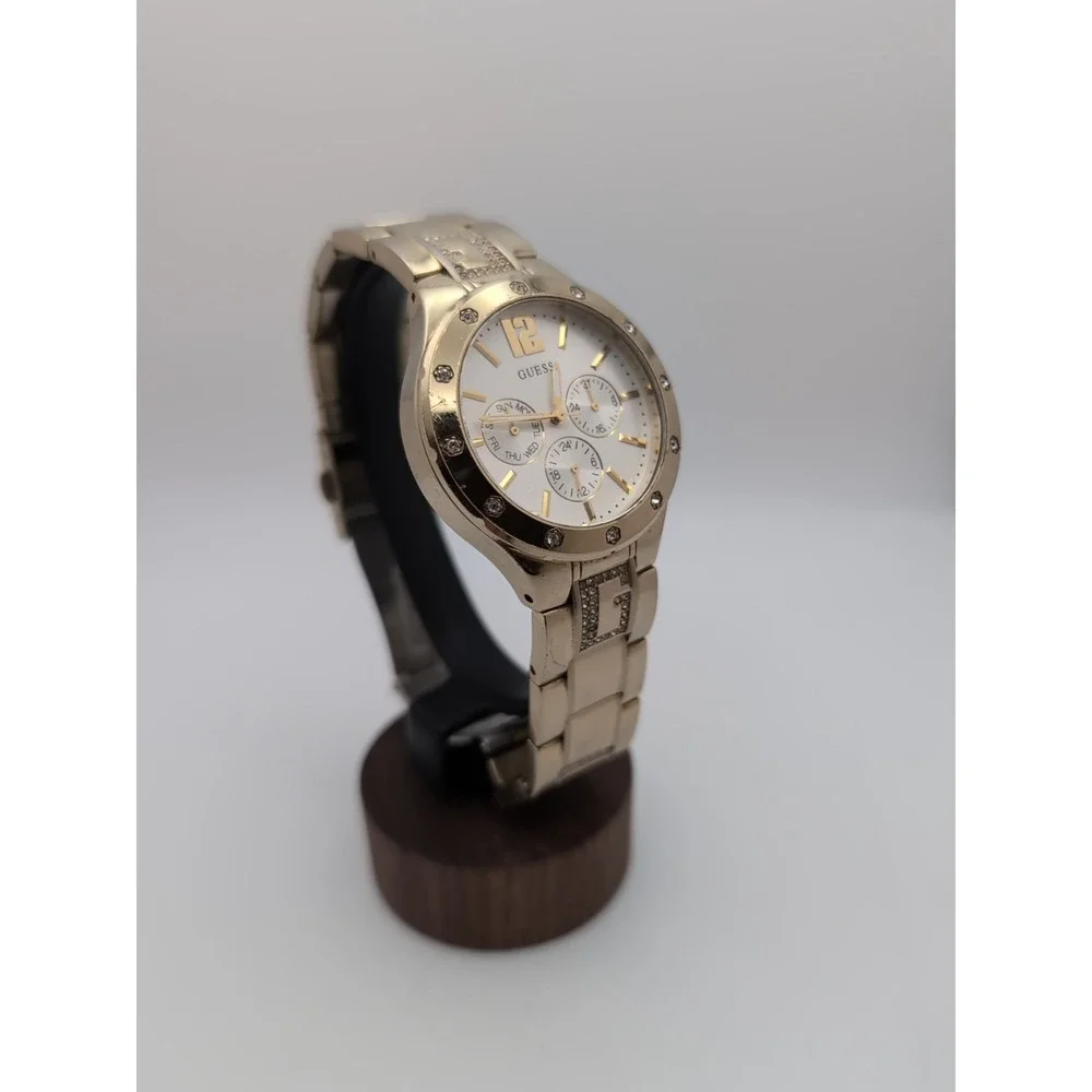 GUESS Women's U15078L1 Quartz Analog Chrono Dress Watch. Good Tone w Crystal 
